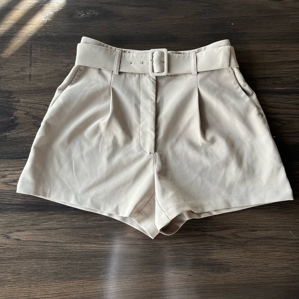 Dynamite High-Waist Pleated Belted Shorts in Light Taupe